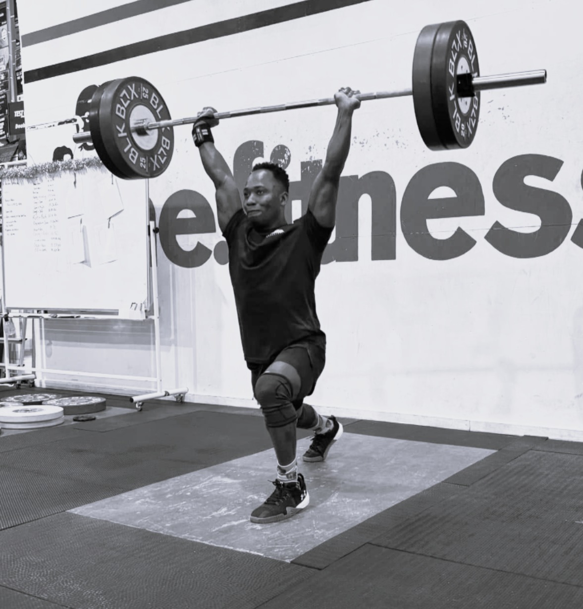 An athlete showing intense focus before a heavy lift